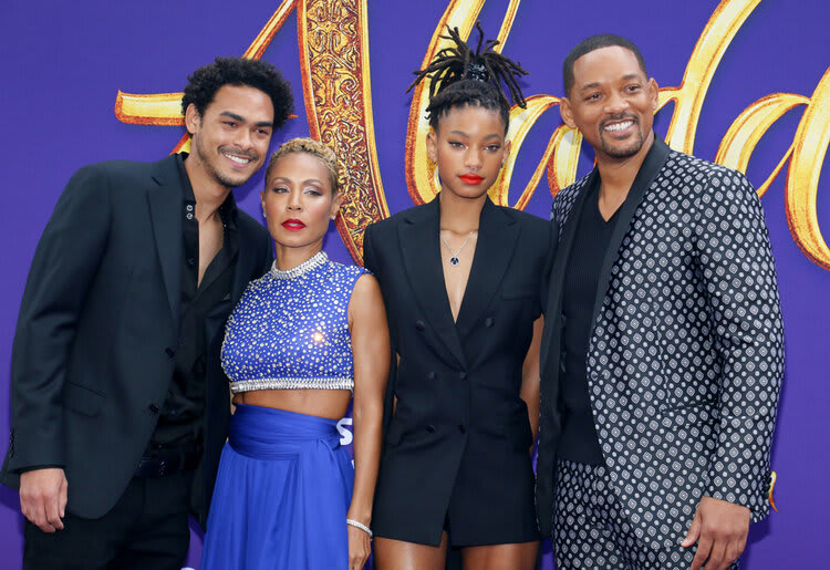 Will, Jada, Willow, and Trey Smith attending a red carpet event.