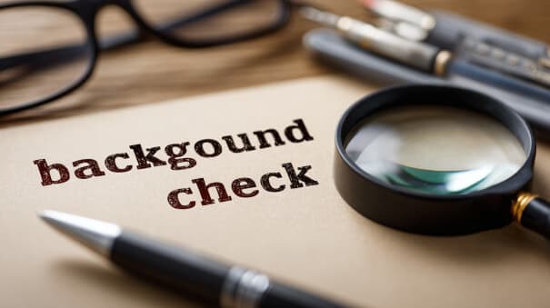 background check a close up of a piece of paper with the words background check on it