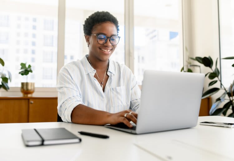 a woman building a resume website
