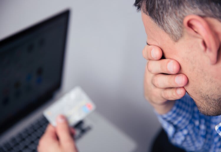 A man who realized that someone opened a debit card in his name. 