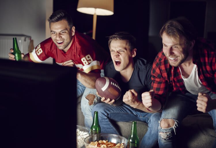 A group of friends streaming the Super Bowl.