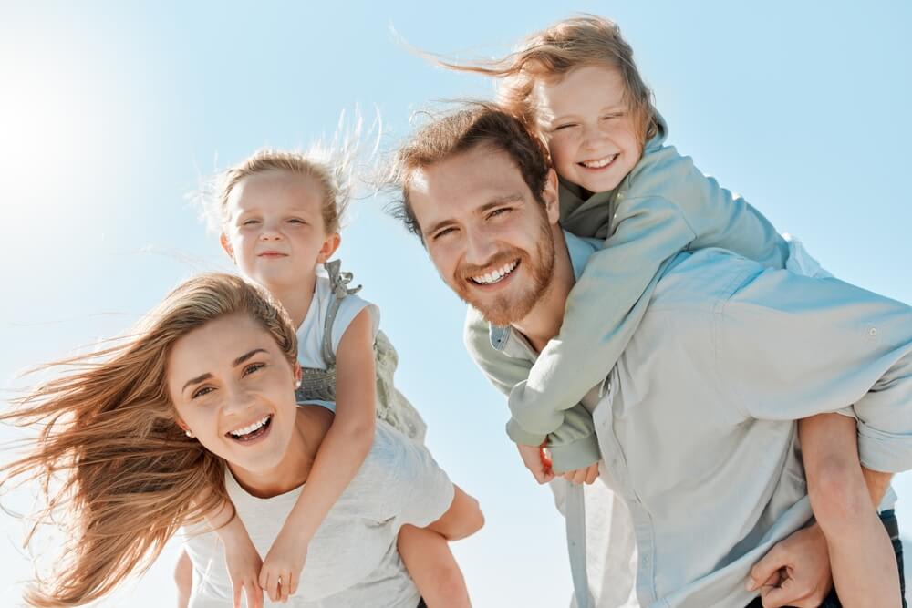 Family on holiday, sky and travel for bonding, children and fun with parents. 