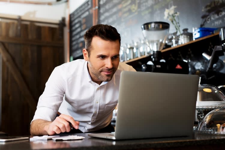 Man making a website with Weebly Man making a website with Weebly