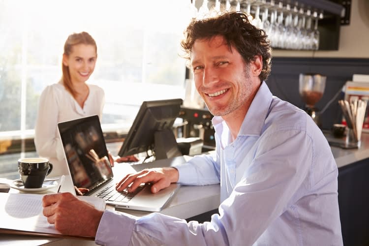 Man making a Wordpress website Man making a Wordpress website
