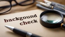 a close up of a piece of paper with the words background check on it