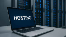 a laptop with the word hosting on the screen