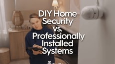 a white couch sitting next to a white wall