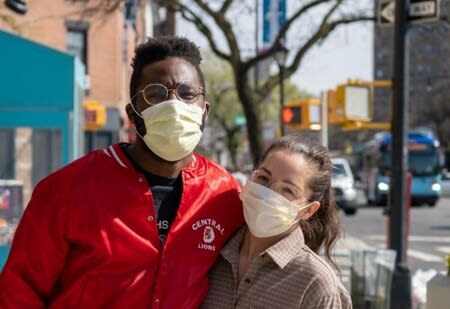 A couple wearing masks