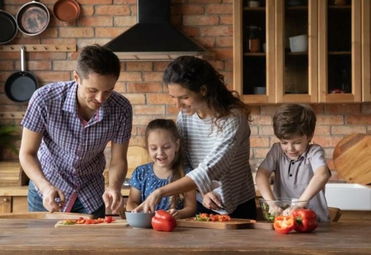 A family cooking dinner together